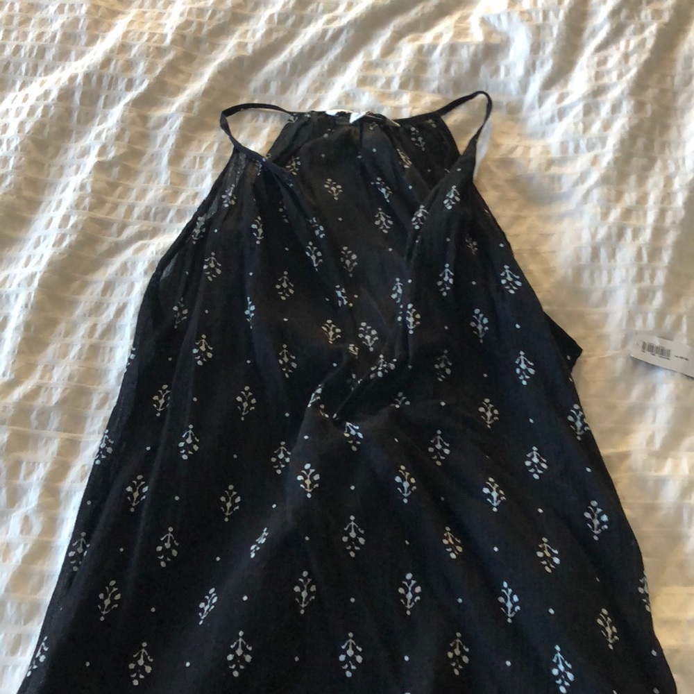 NWT strappy tunic style top.